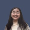 A person smiling at the camera AI-generated content may be incorrect_